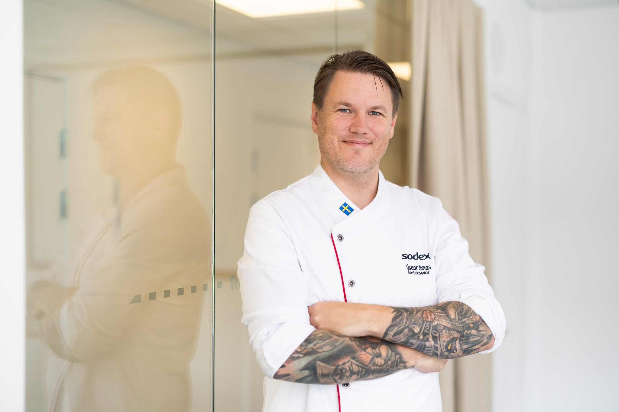 Chef Oscar Jonasson standing with arms folded