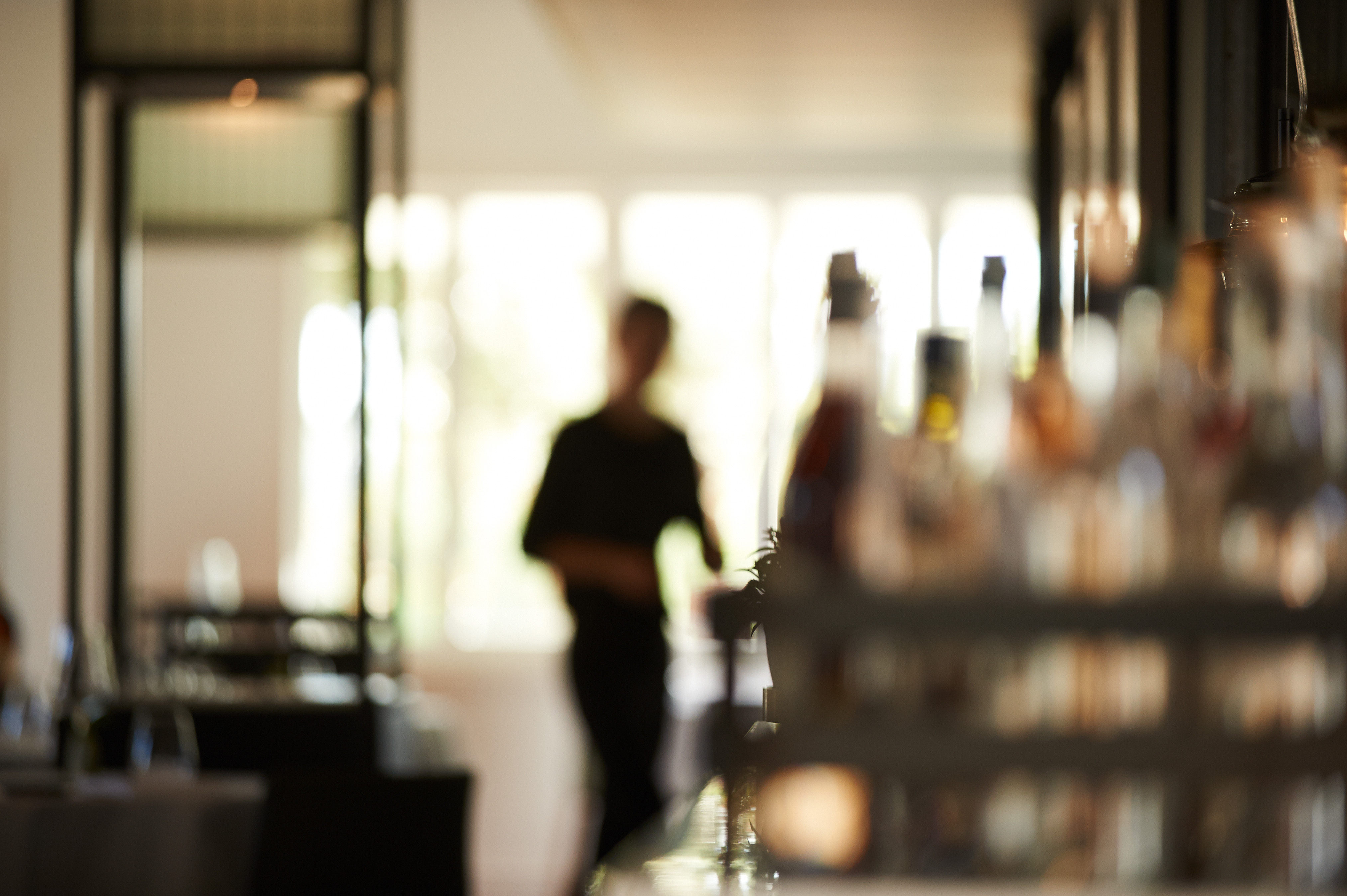 Out of focus shot of person in Brae Dining Room And Bar