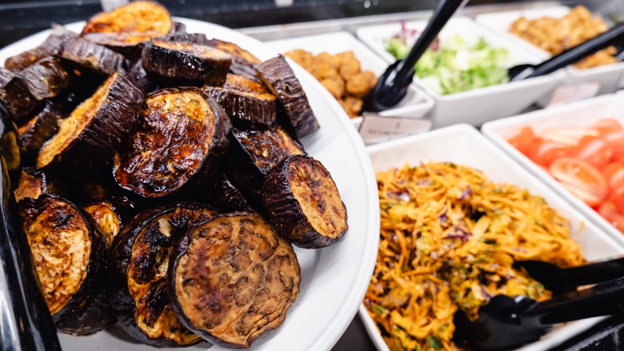 Roasted aubergine and other plant-based dishes in the salad bar at King's College London