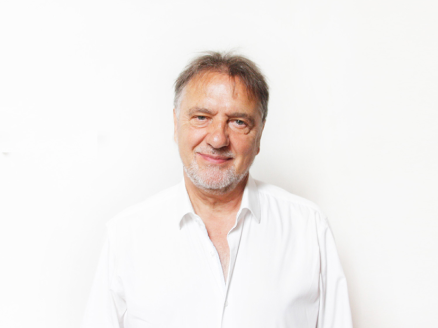 A headshot of Raymond Blanc OBE against a white background