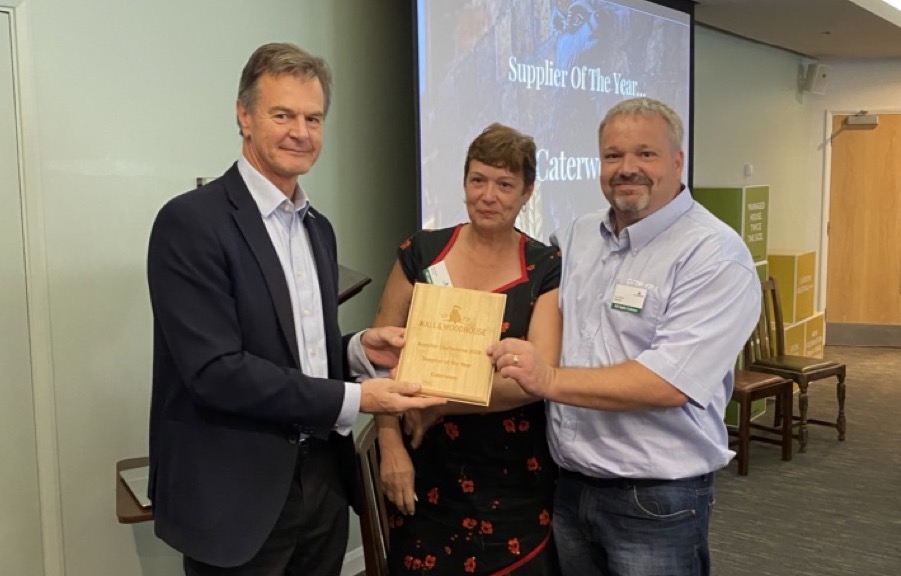 Hall & Woodhouse Supplier Awards Supplier Of The Year award being accepted by Paul And Terina Ducker, Caterworx