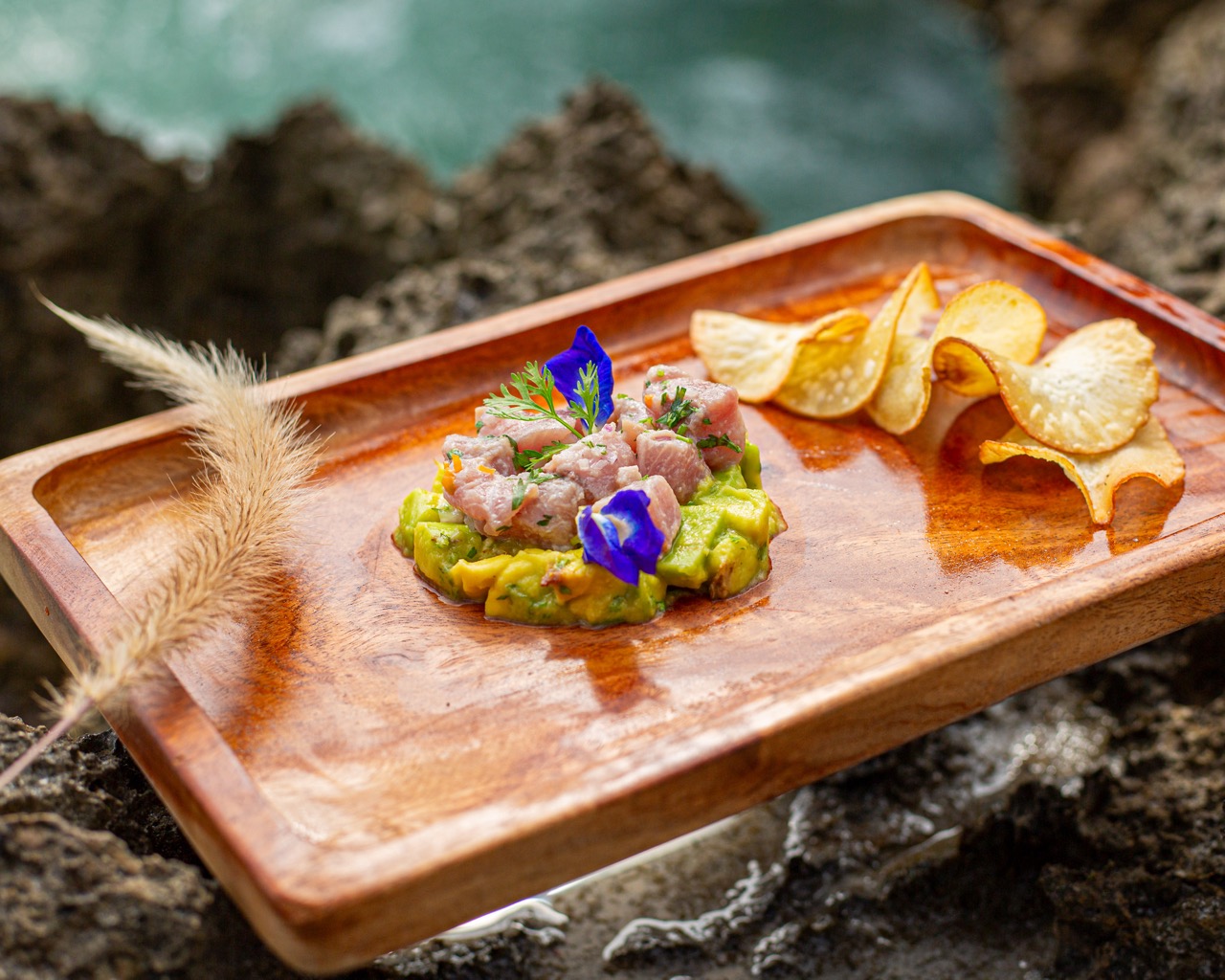 A wooden tray of beautiful food at Fahari Off The Grid