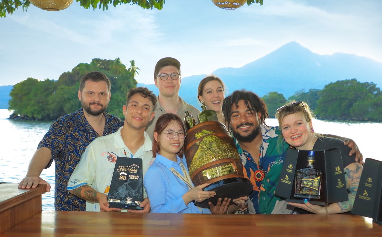 Flor De Cana Cocktail Competition Winner Julie Nguyen with trophy