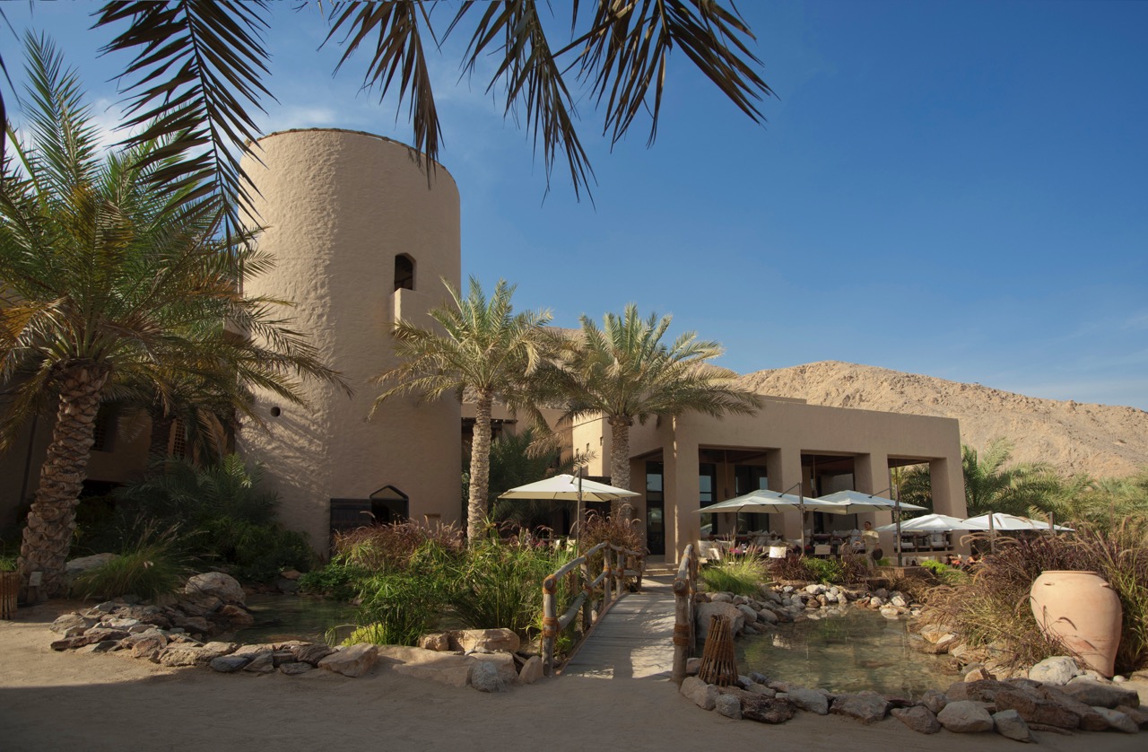 Exterior shot of Six Senses Zighy Bay on a sunny afternoon