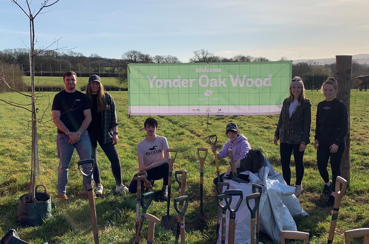 Team of staff from THE PIG Hotels doing volunteer work planting trees