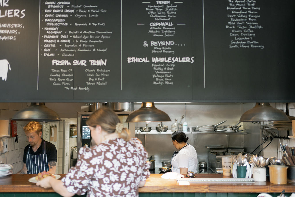 Chefs and floor staff at the pass at The Bull Inn, Totnes