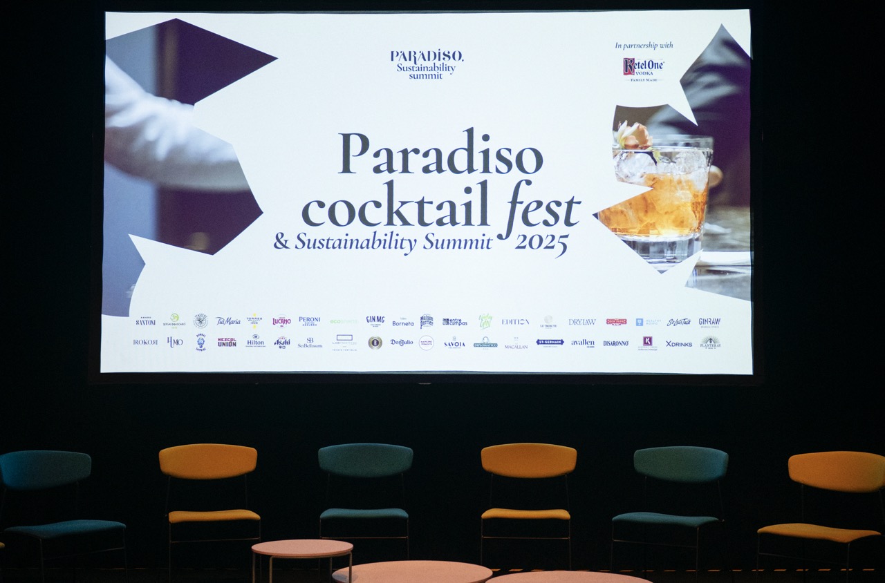 Empty stage with big screen at Paradiso Sustainability Summit