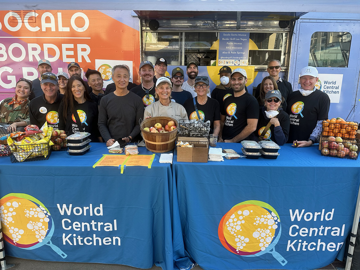 WCK Chef Corps group photo of workers in front of SoCaLo Border Grill food truck