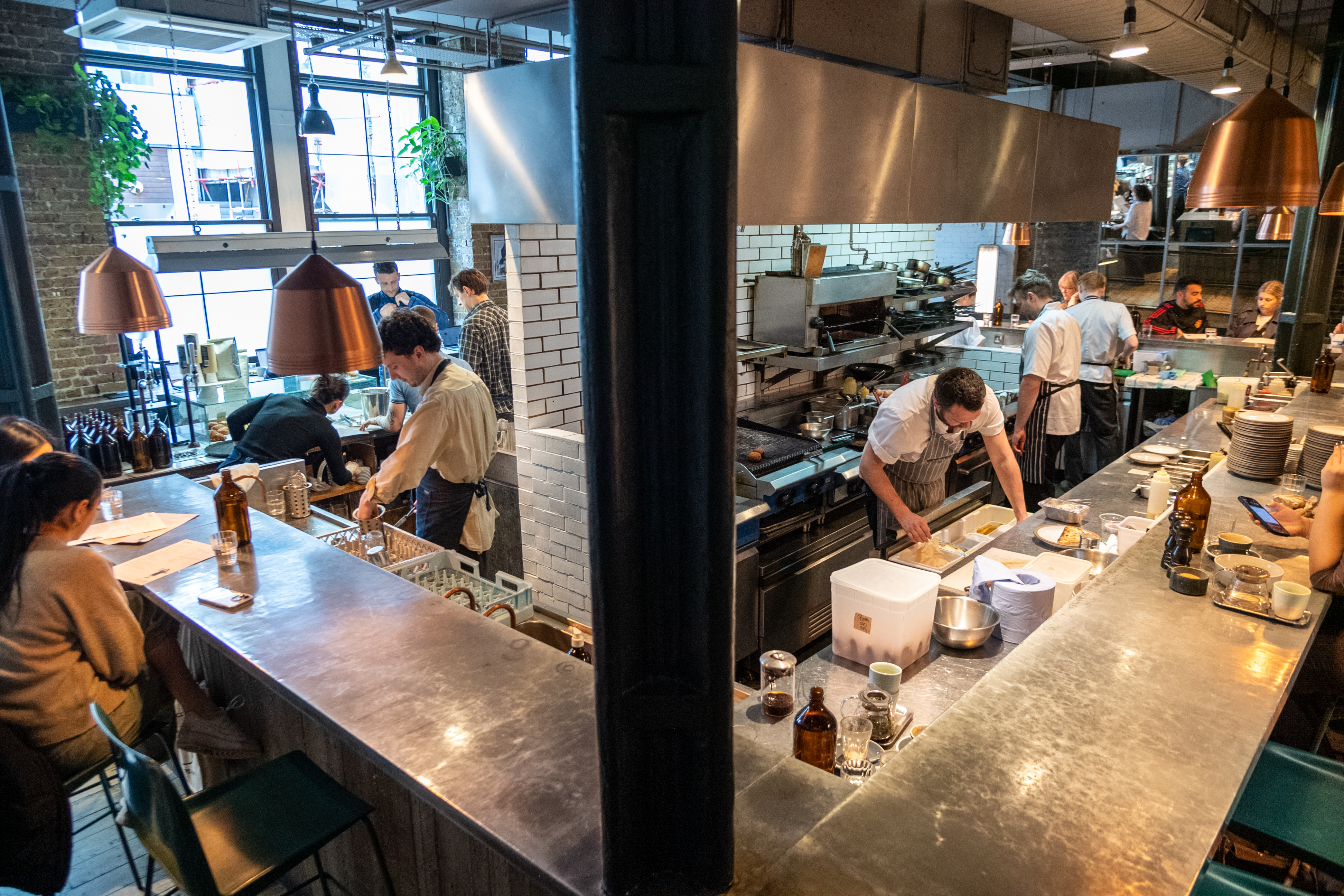 Wide angle shot of team working behind the counter at Ozone Coffee