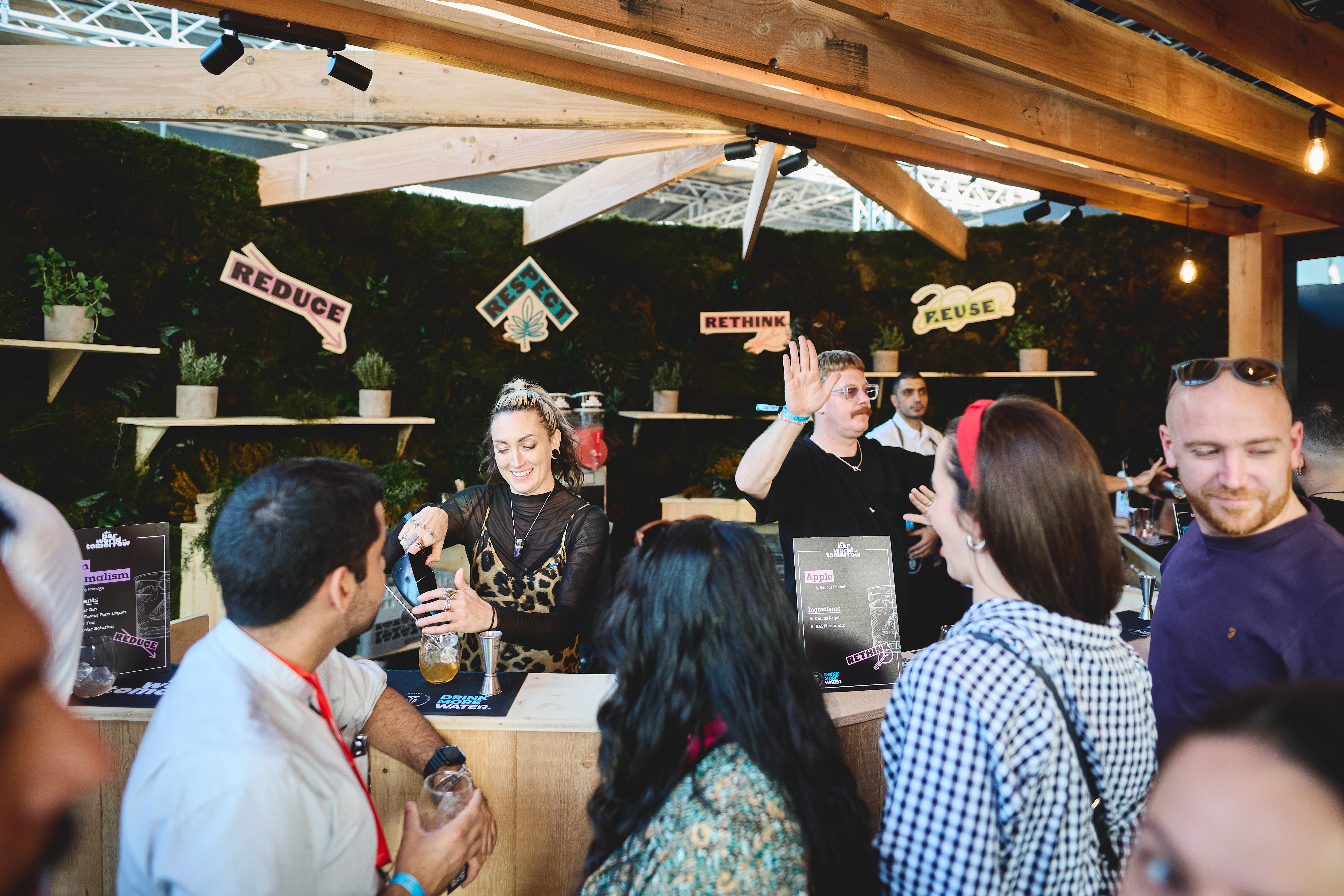 Bartenders mixing drinks for customers at Athens Bar Show 2022