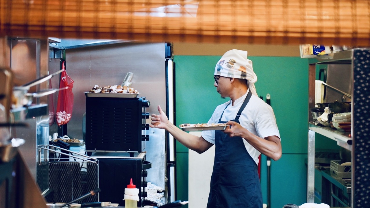 A chef in the kitchen at Liao Studio