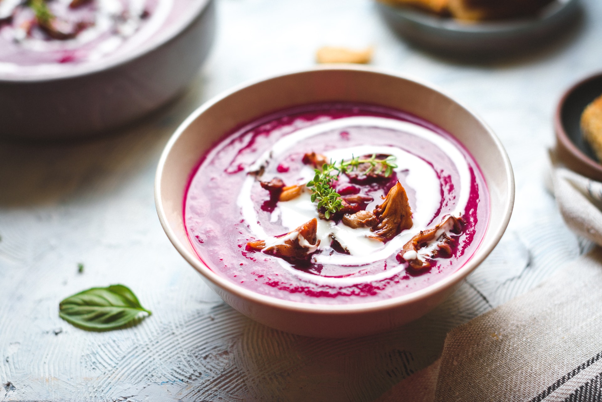 Beetroot soup with creamy drizzle on top