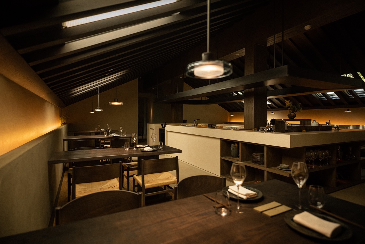 The interior of Lamdre restaurant in Beijing, softly lit