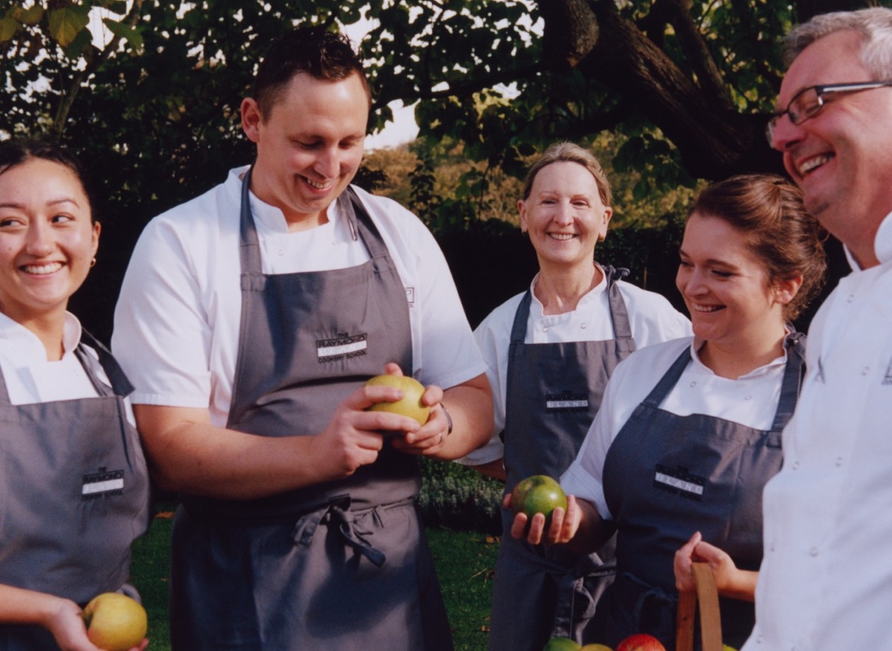 Raymond Blanc with students at the Raymond Blanc Cookery School