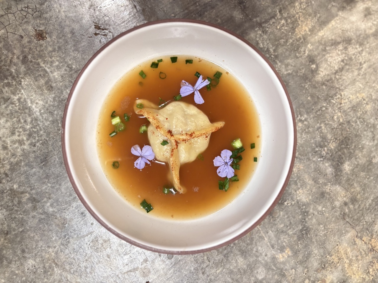 Overhead shot of seaweed broth at Chef's Garden