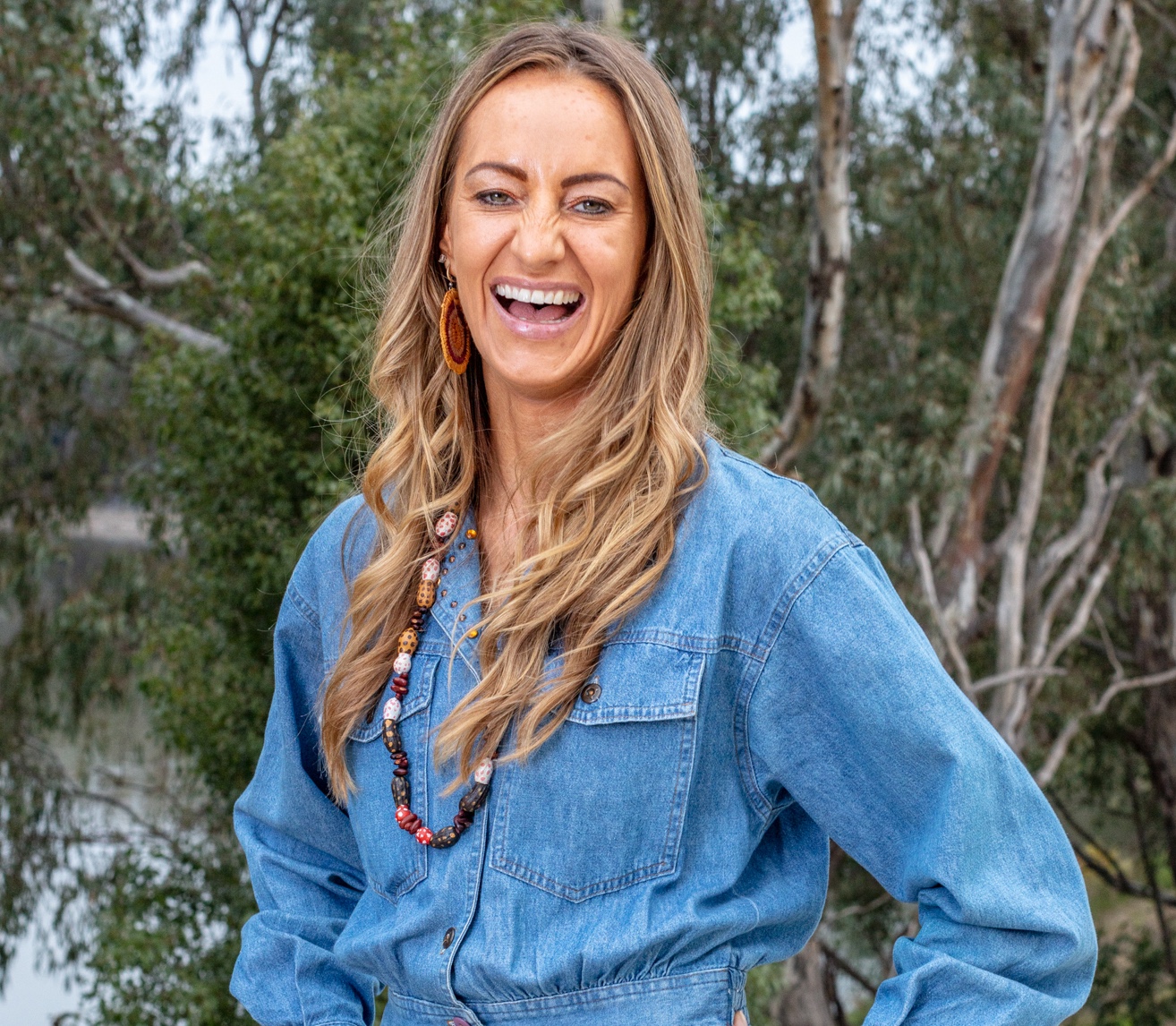 Chef Mindy Woods laughing outdoors
