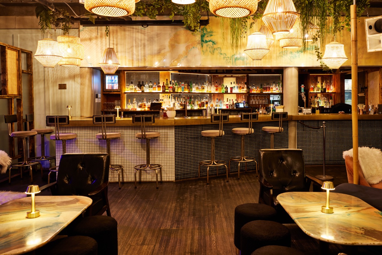 The bar space at Nine Lives with seating areas