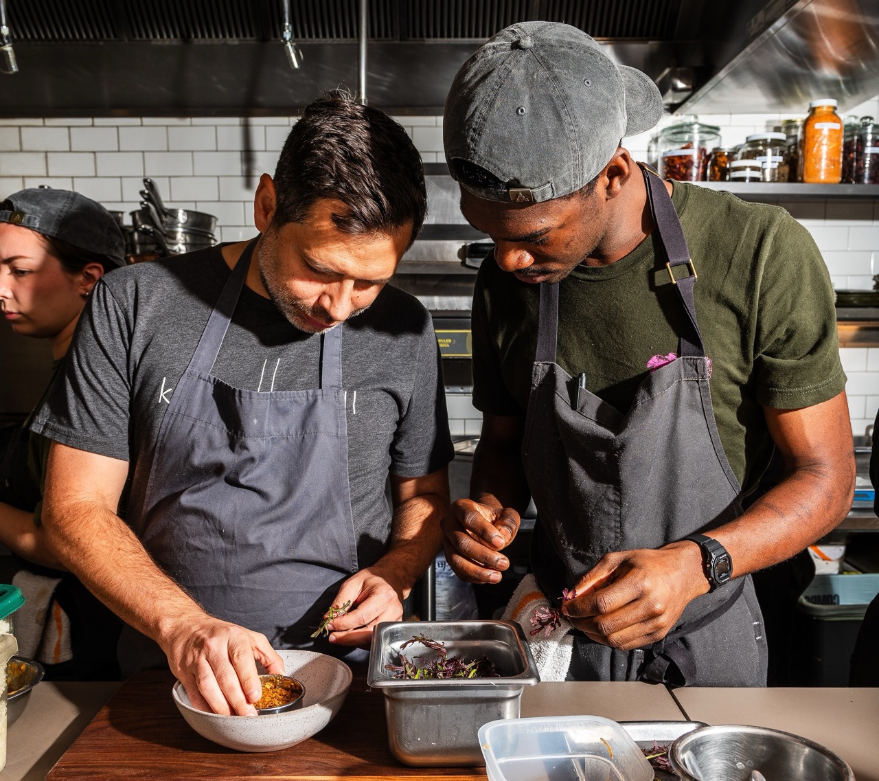 Chefs in the kitchen at Oyster Oyster, Washington DC