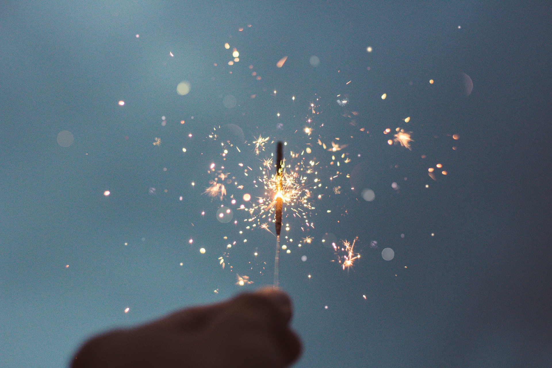 Hand holding sparkler