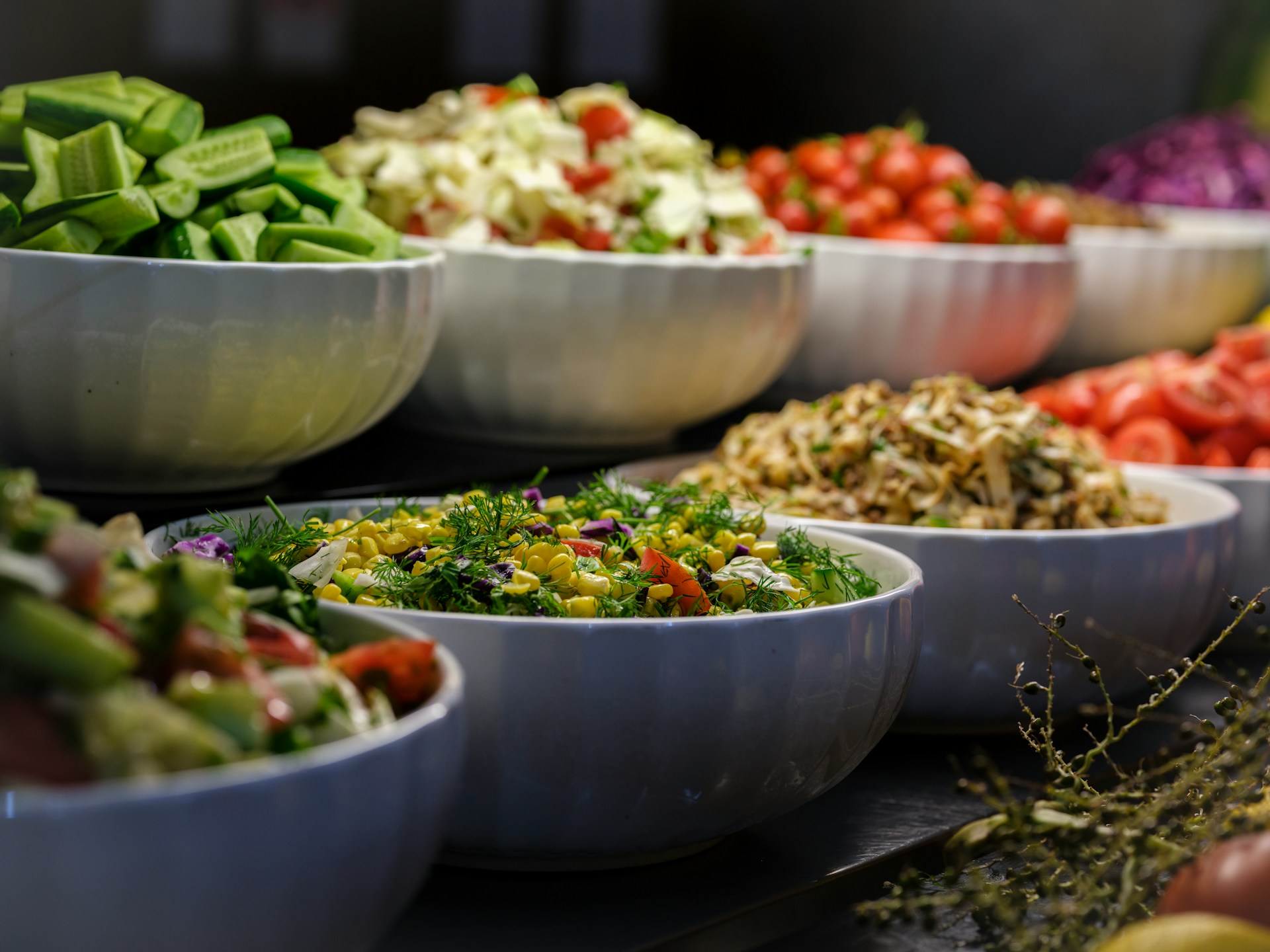 Bowls of healthy salads at buffet