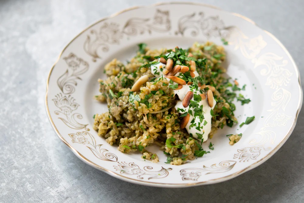 Freekeh grain pilaf in elegant white bowl