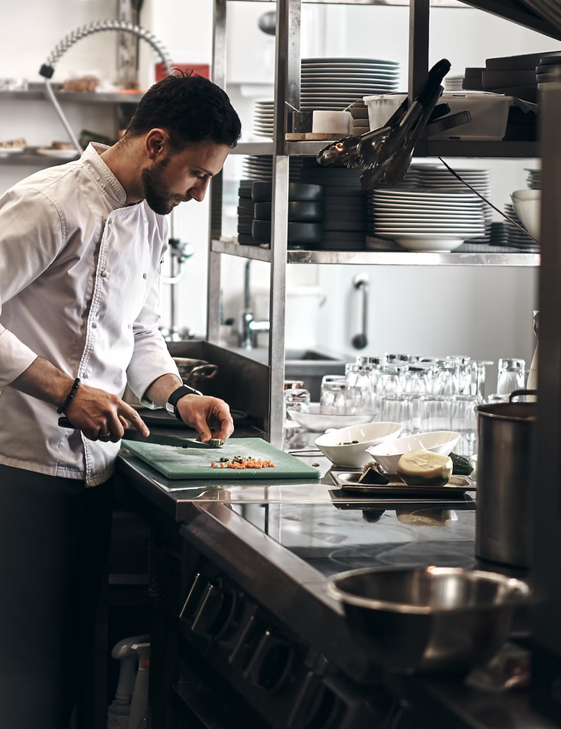 A male chef working in a kitchen