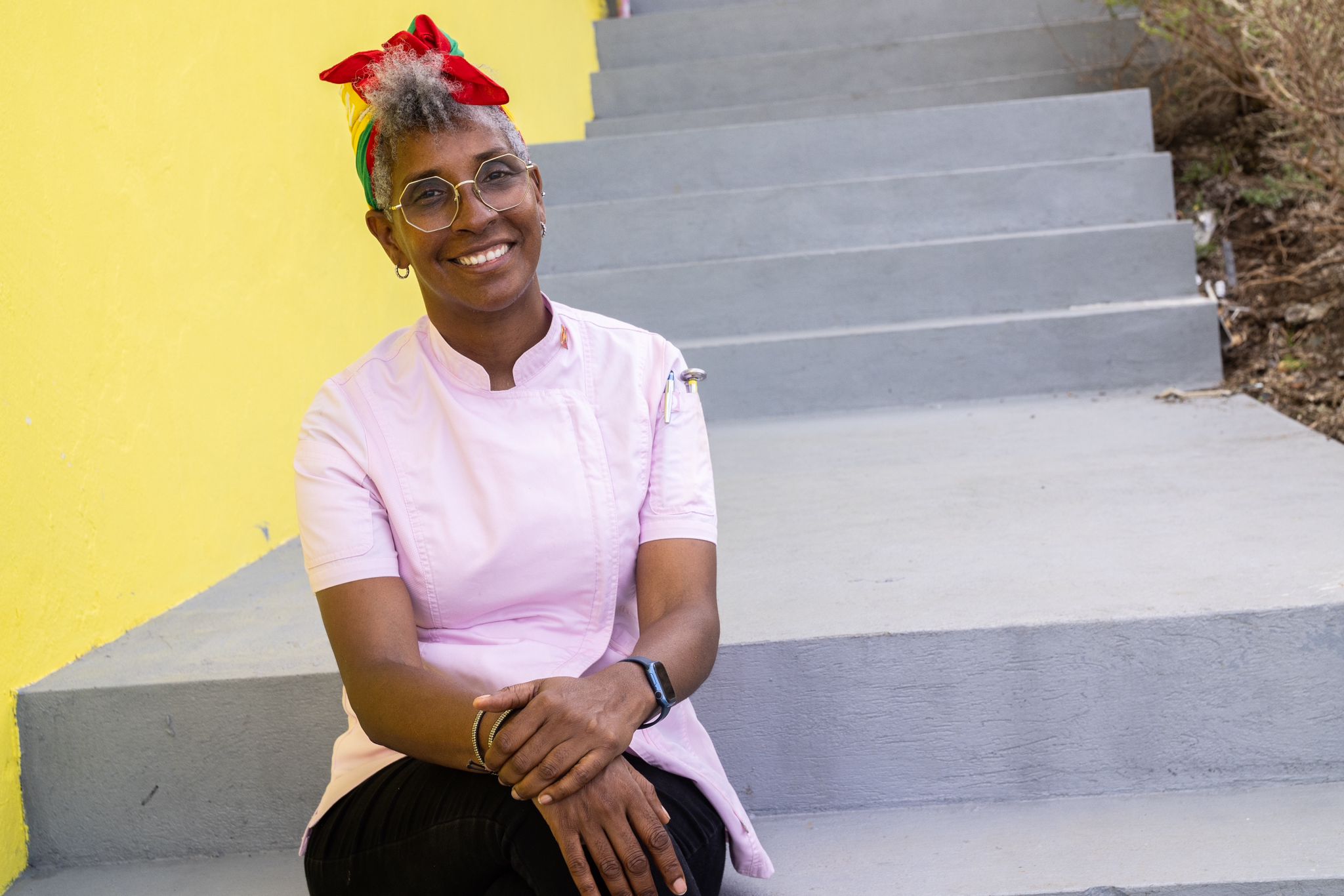 WCK Chef Corps Chef Belinda Bishop sitting on steps outside