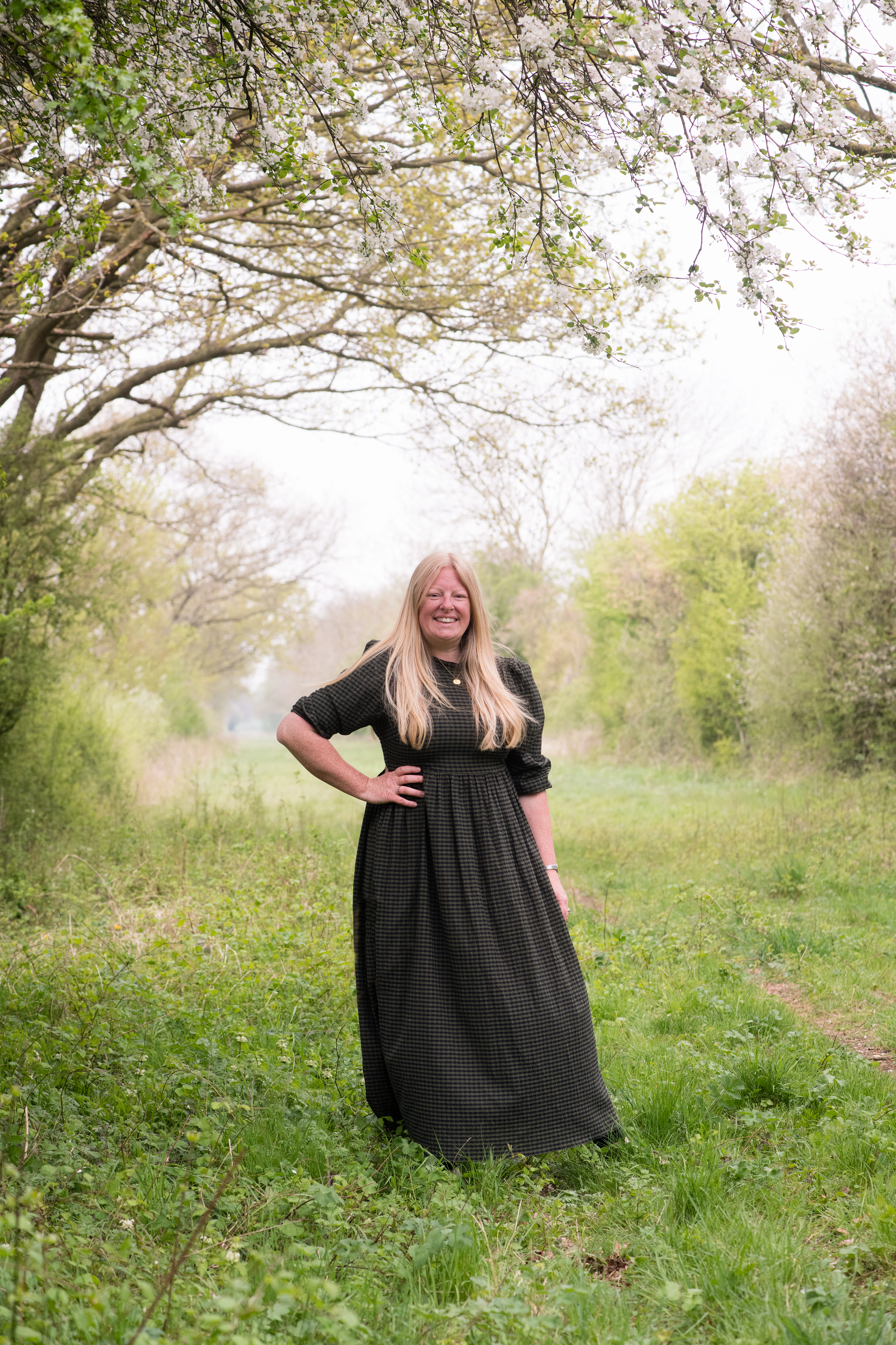 Love British Food Ambassador Jenny Jefferies standing in field wearing a dress