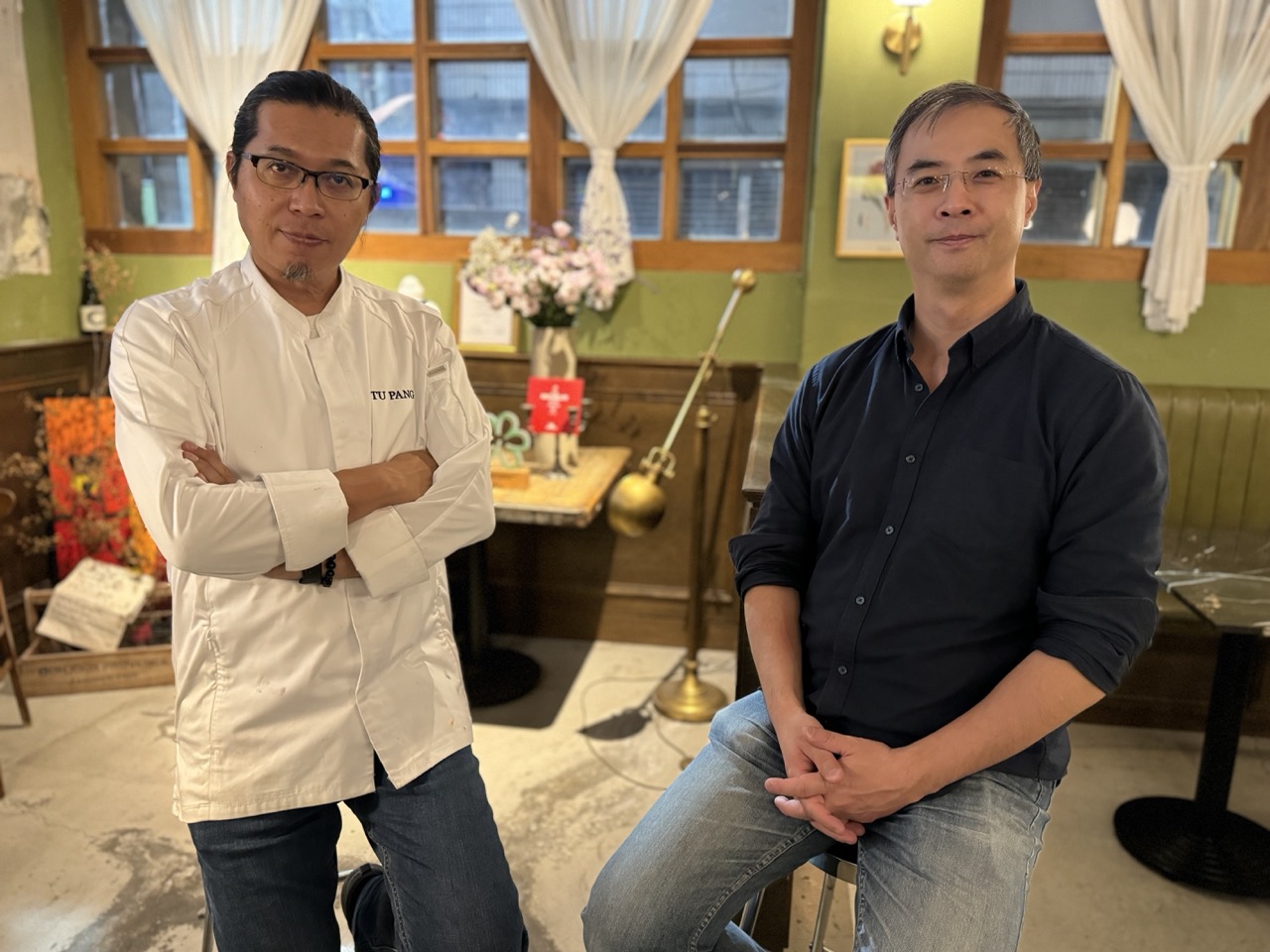 A restaurant manager and a chef in Taiwan smiling for the camera