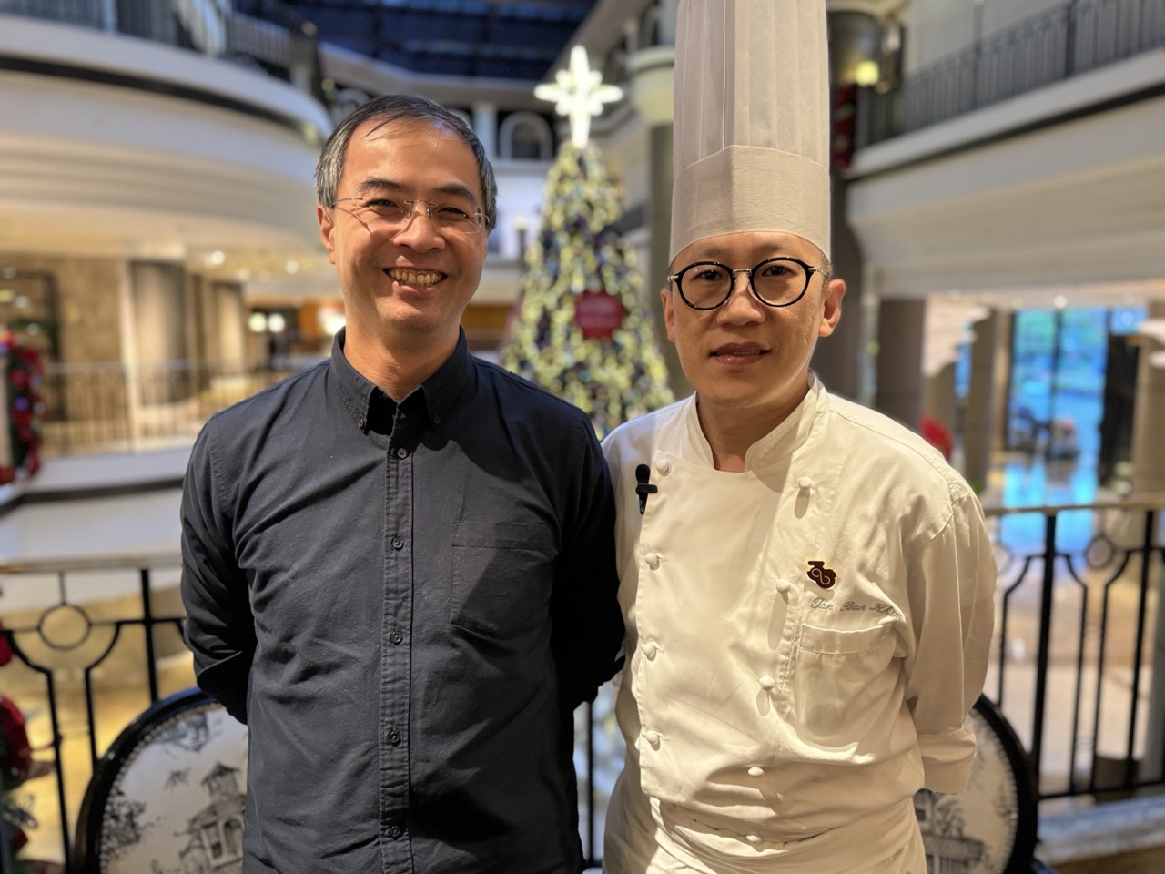 A restaurant manager and a chef in Taiwan smiling for the camera