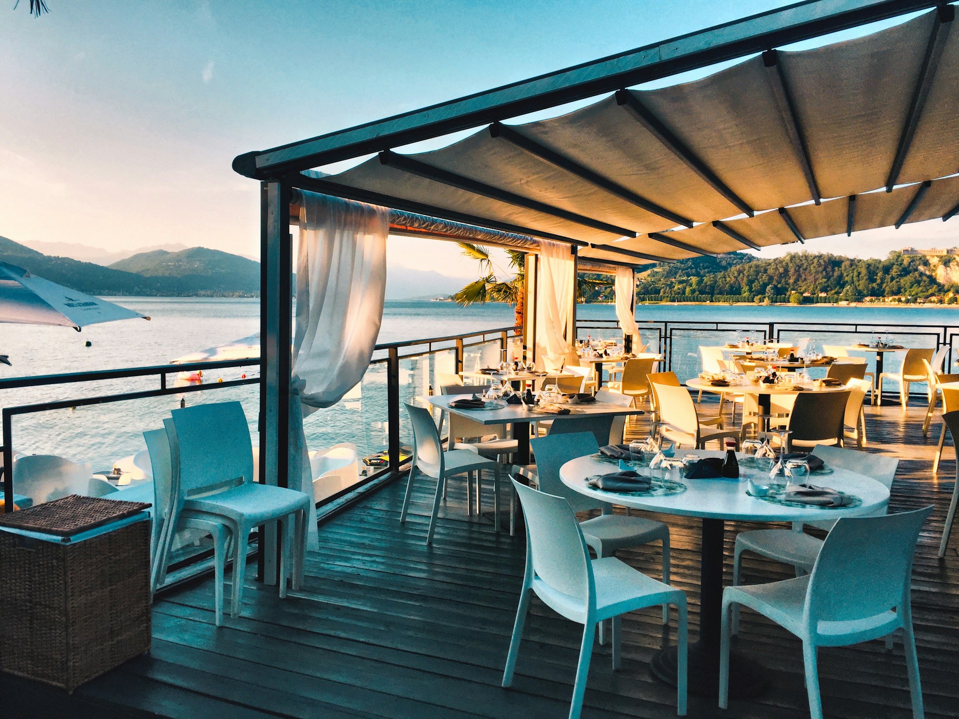 Exterior of restaurant beside the sea on a sunny evening