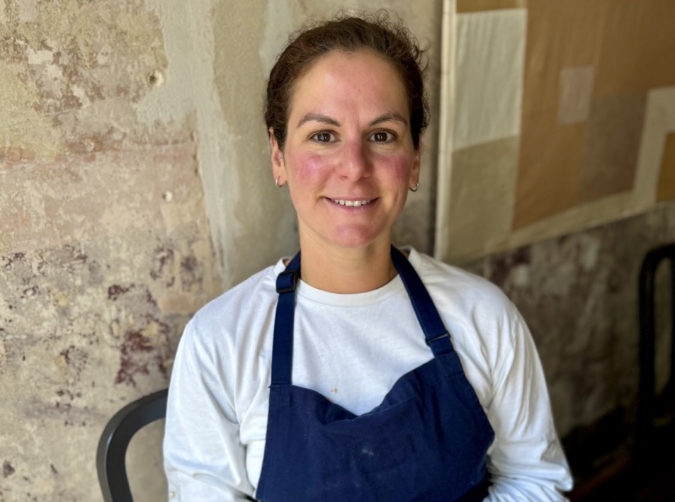 Eve Seemann, Head Chef of Apricity, UK, seated at table