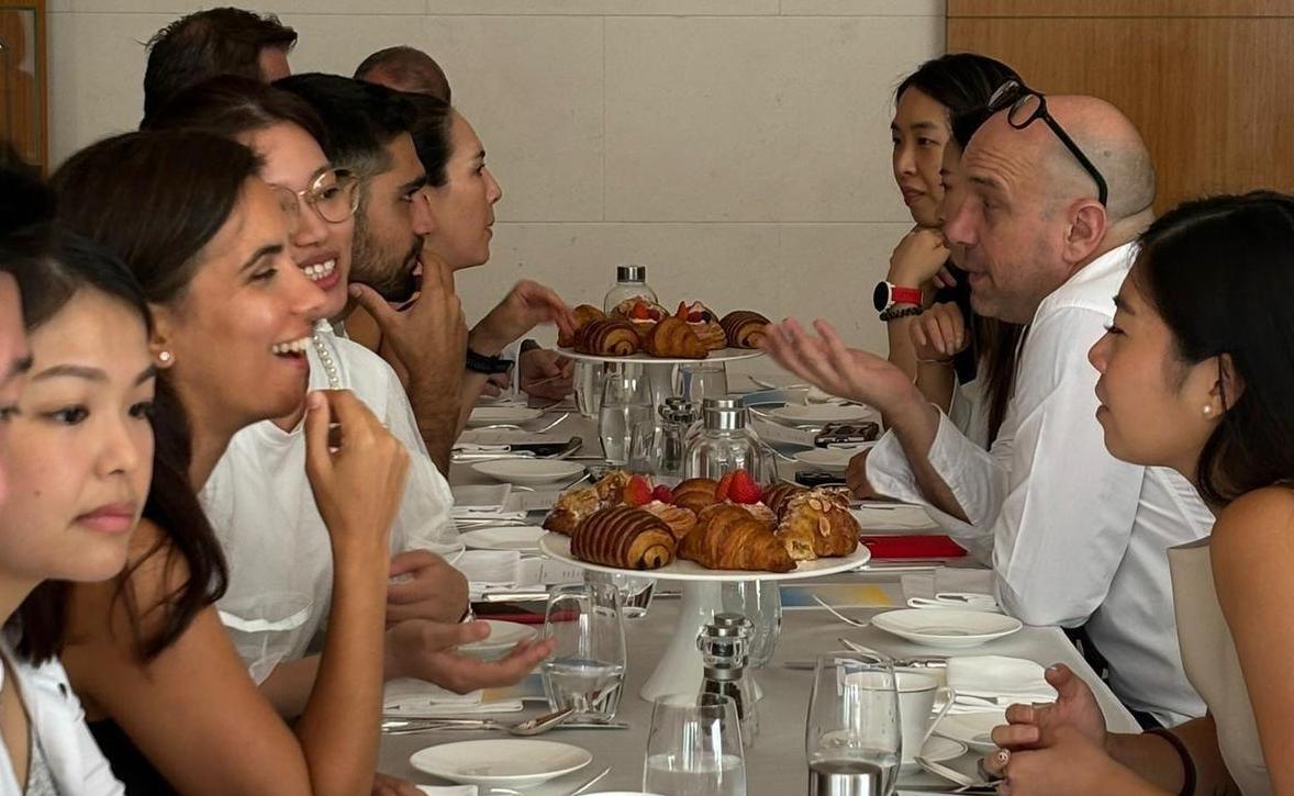 People talking over breakfast at the launch of 'Small Changes, Big Impact: Driving Sustainability Through Hospitality', a free resource from Belu and The Sustainable Restaurant Association