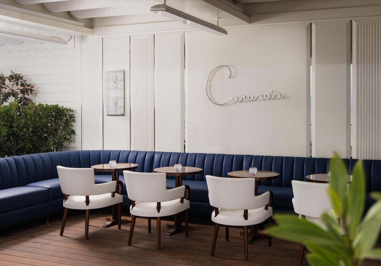 Interior shot of tables at Caruso's Rosewood Miramar Beach