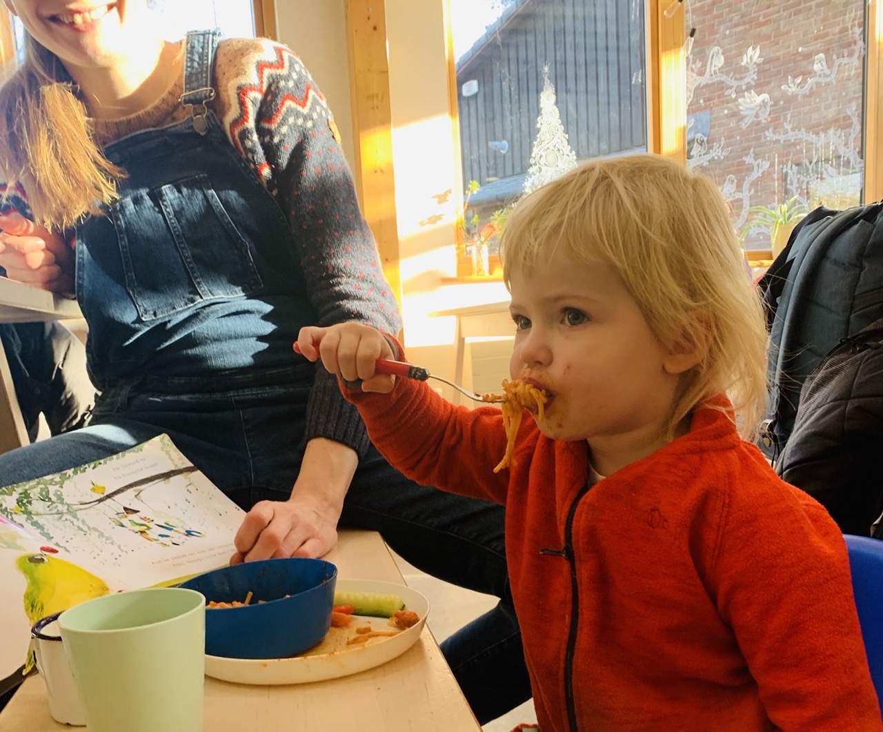 Child eating food at Windmill Hill City Farm Café 