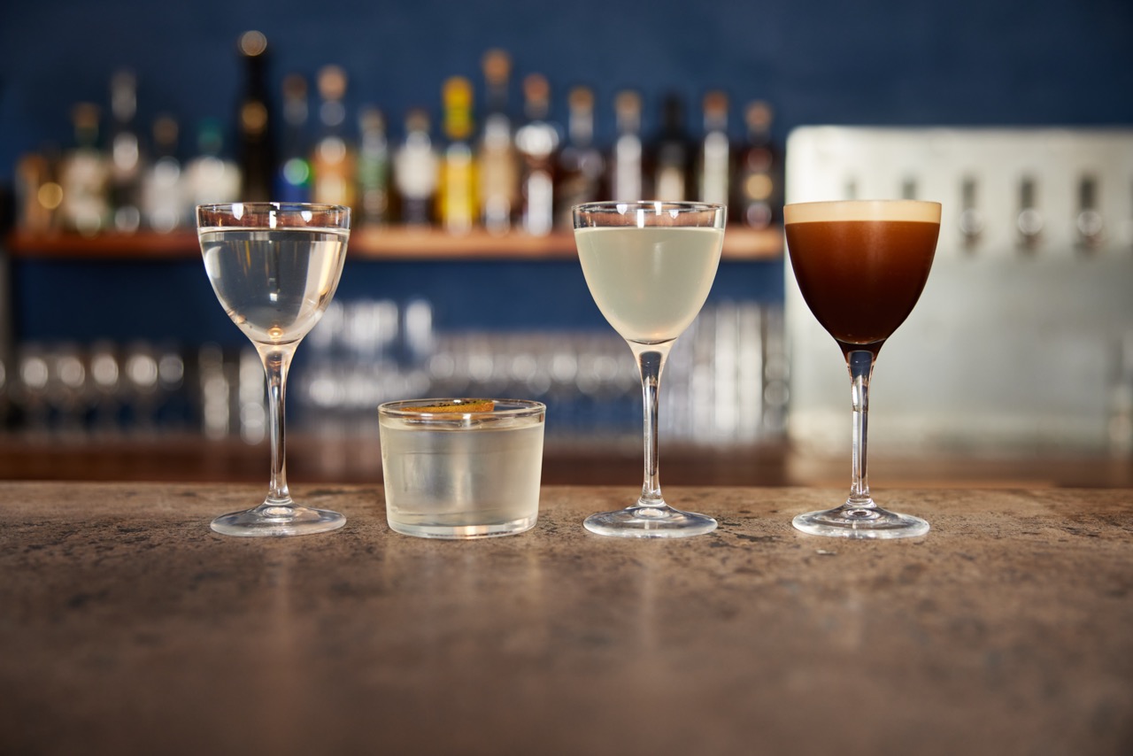 Four cocktails on the bar counter at Little Mercies