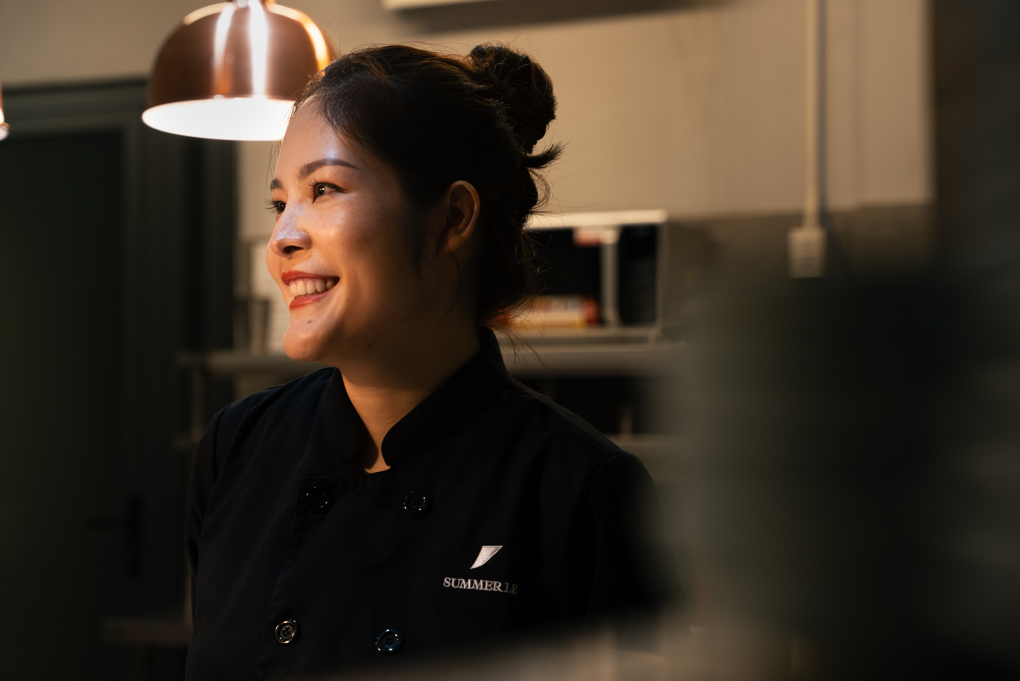 Chef Summer Le of Nén Restaurants in black chef jacket