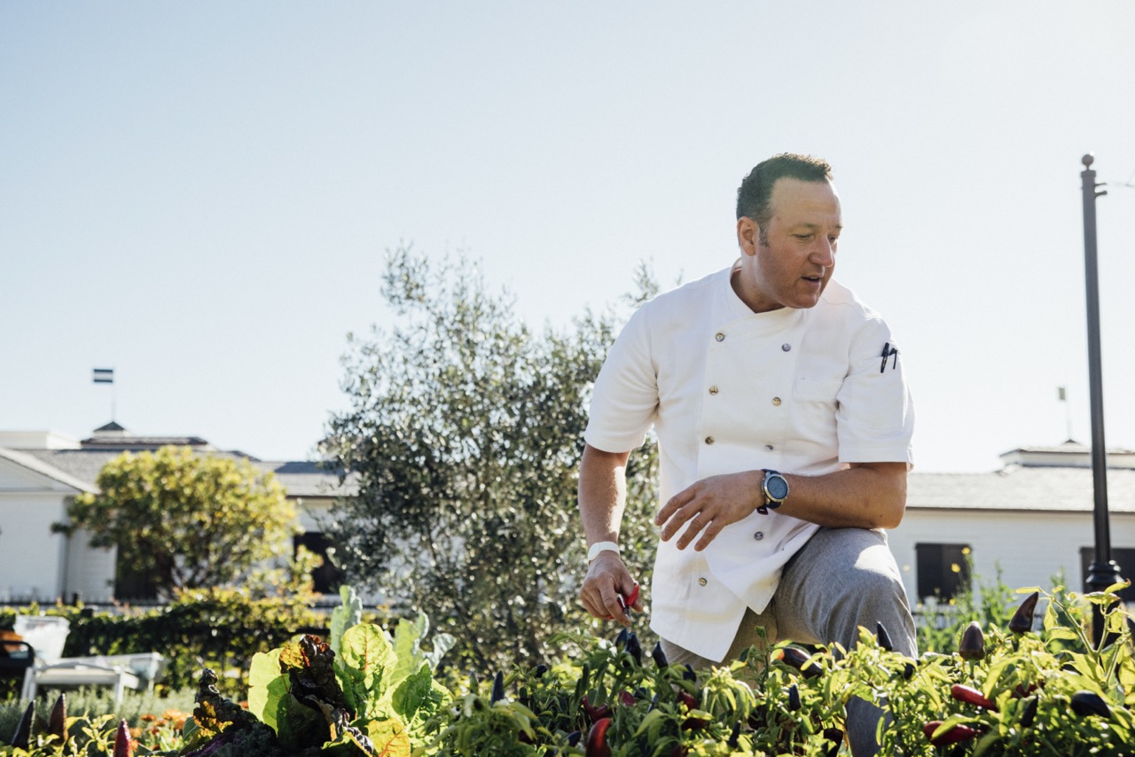 Chef Massimo Falsini in the garden of Caruso's Rosewood Miramar Beach