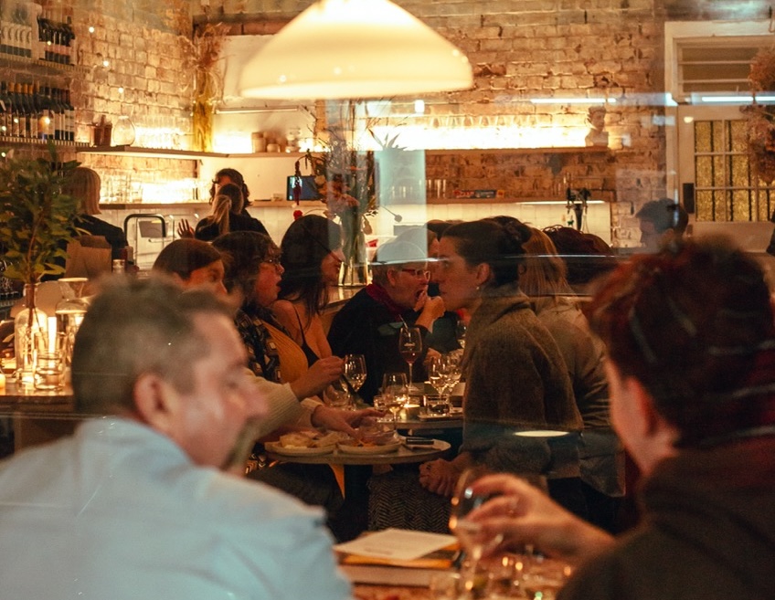 A busy night in Famelia wine bar, Newtown, New South Wales, Australia