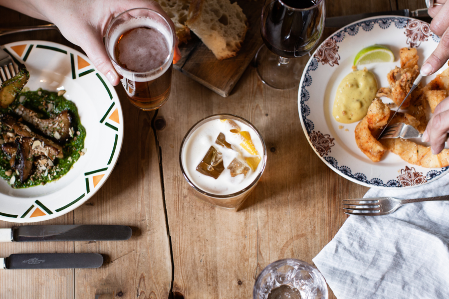 Overhead shot of dishes and cocktail at The Bull Inn Totnes 