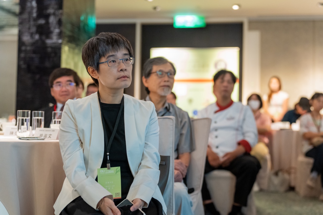 Eunice Yu, Director Of Sustainable Development Center Of WNC, listening to presentation