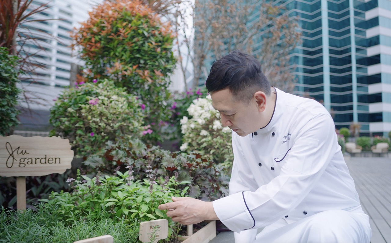Executive Chef Tony Wong in the herb garden at JW Marriott Hotel HK 