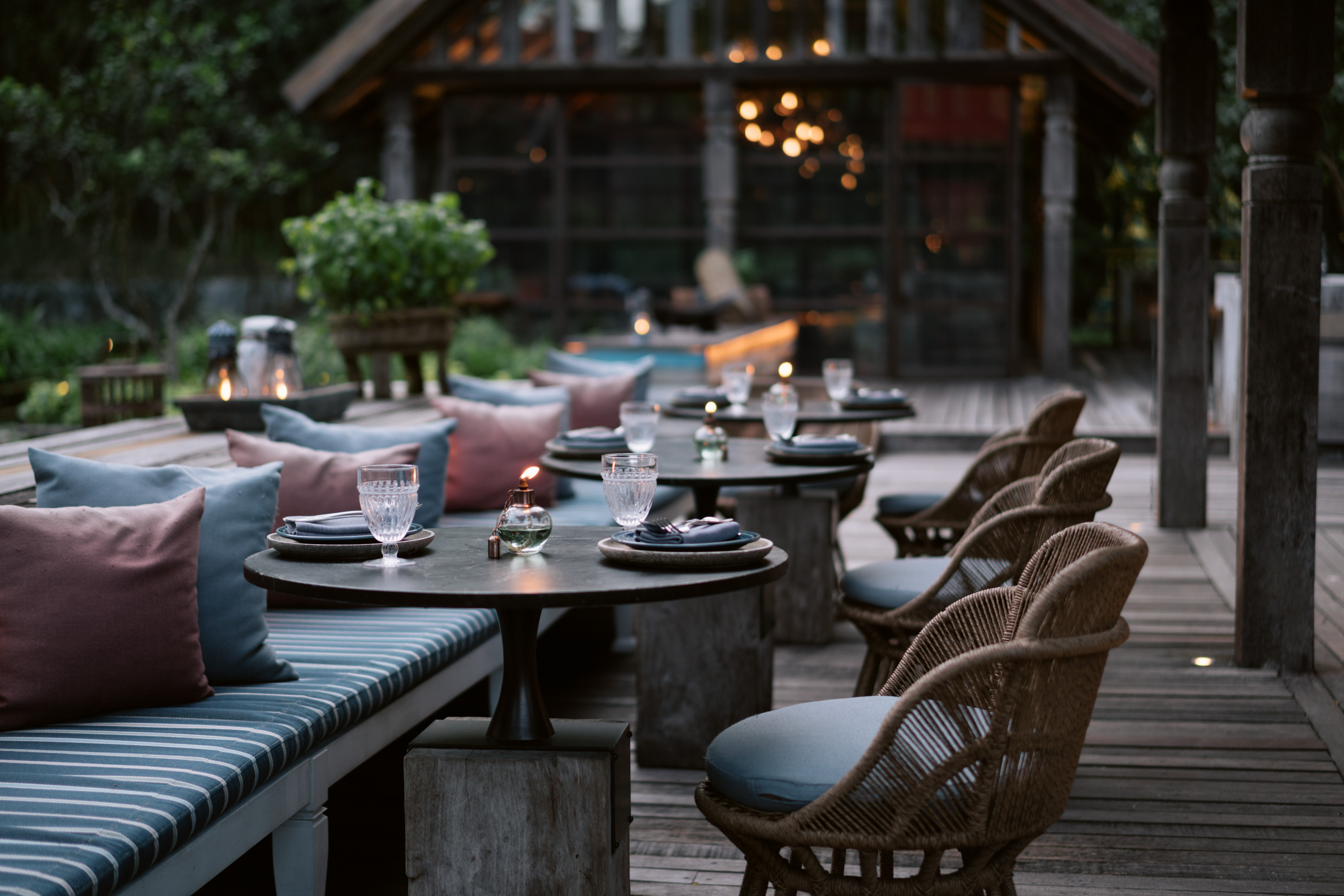 Evening at the outdoor seating at Ta Khai restaurant, Rosewood Phuket