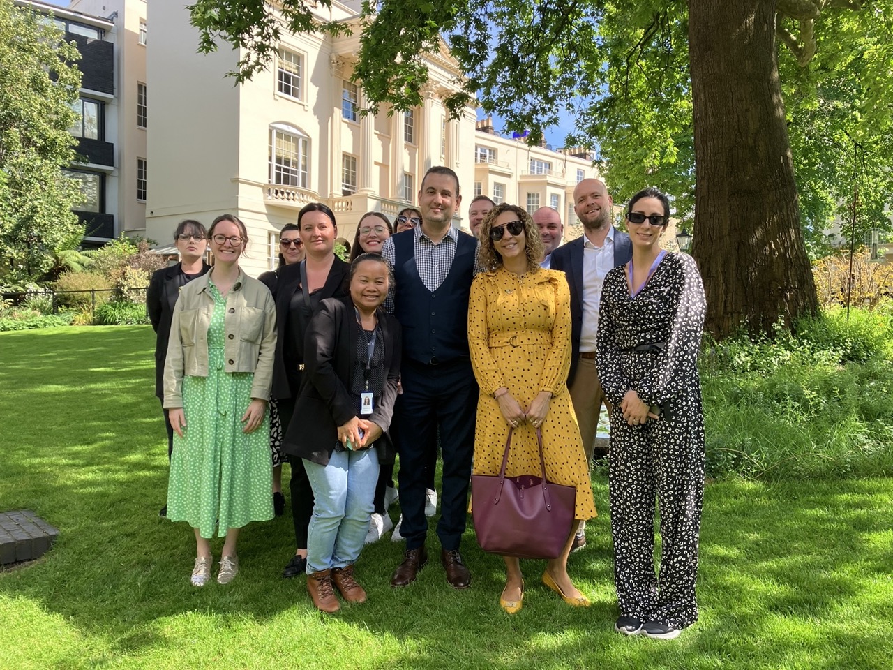 Vacherin Green Teams Planet Ambassadors meeting with members standing outdoors in sunny park