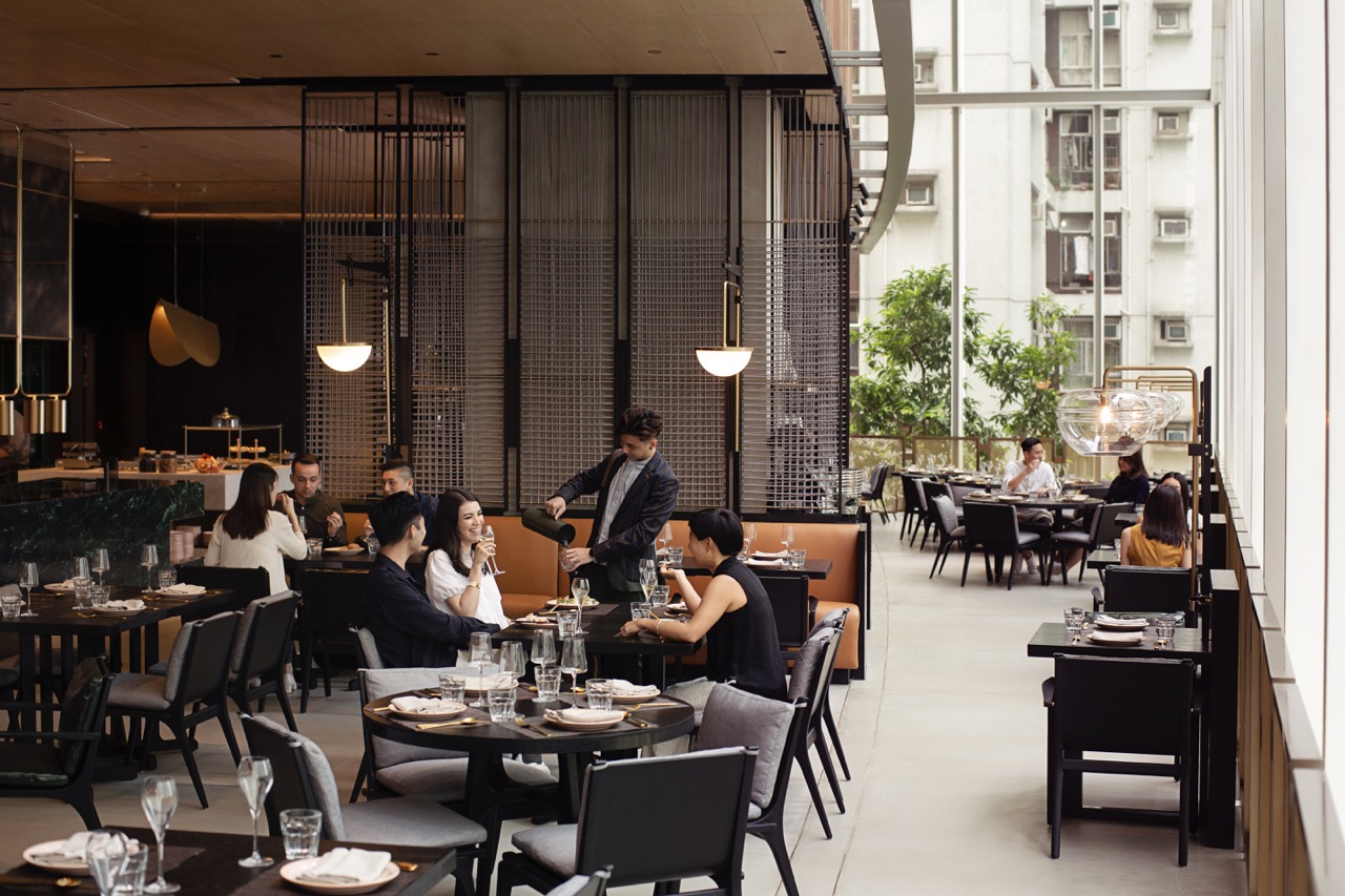 Customers eating in FEAST restaurant, EAST Hotel Hong Kong
