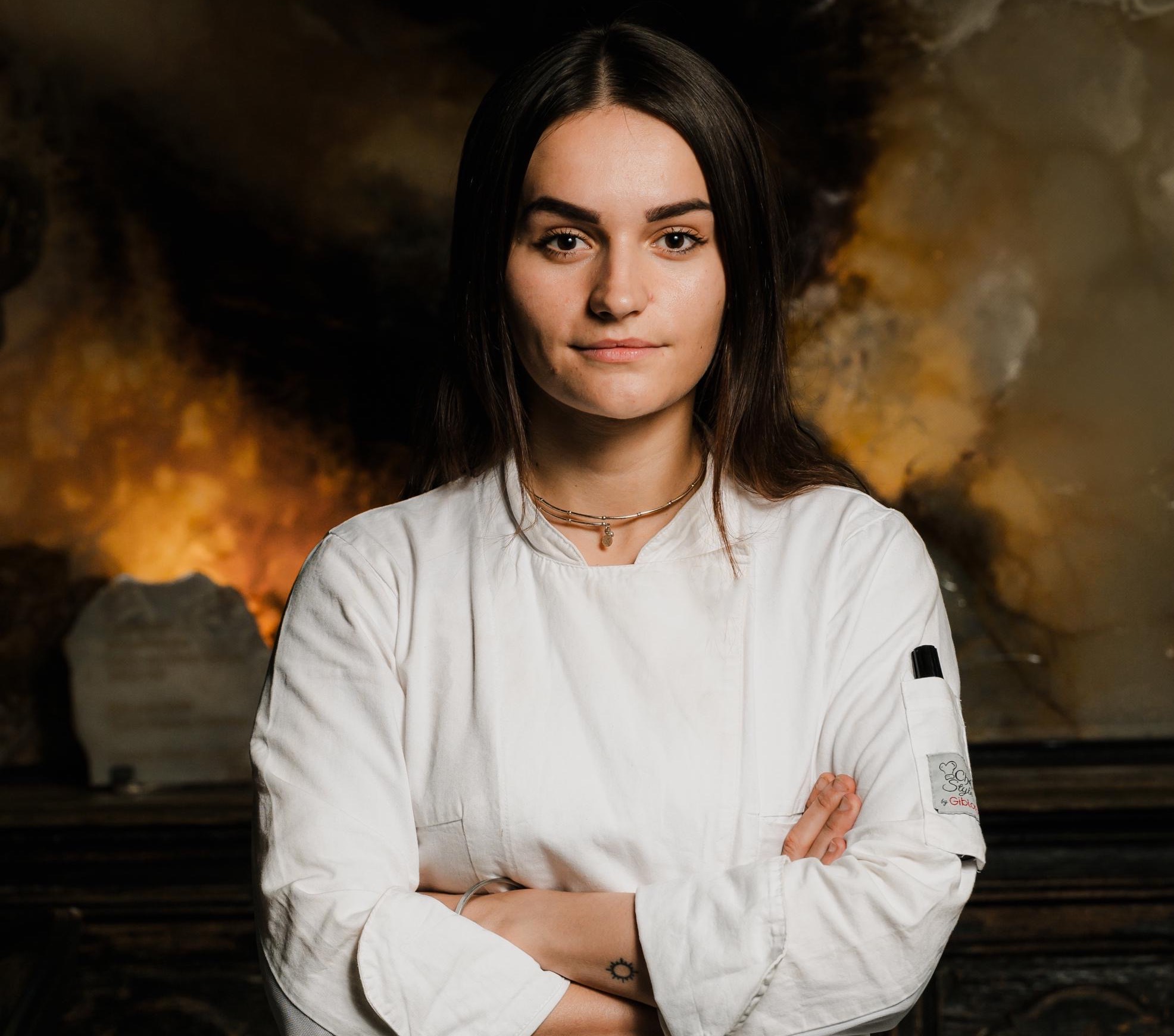 Josefina Zojza of Locale Firenze restaurant against dramatic dark background