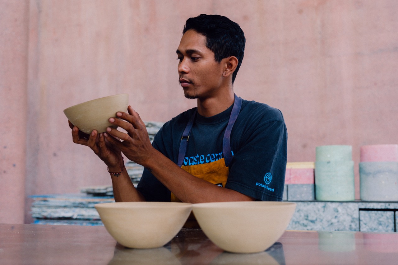 Making bowls out of repurposed materials at Waste Lab in Potato Head, Bali
